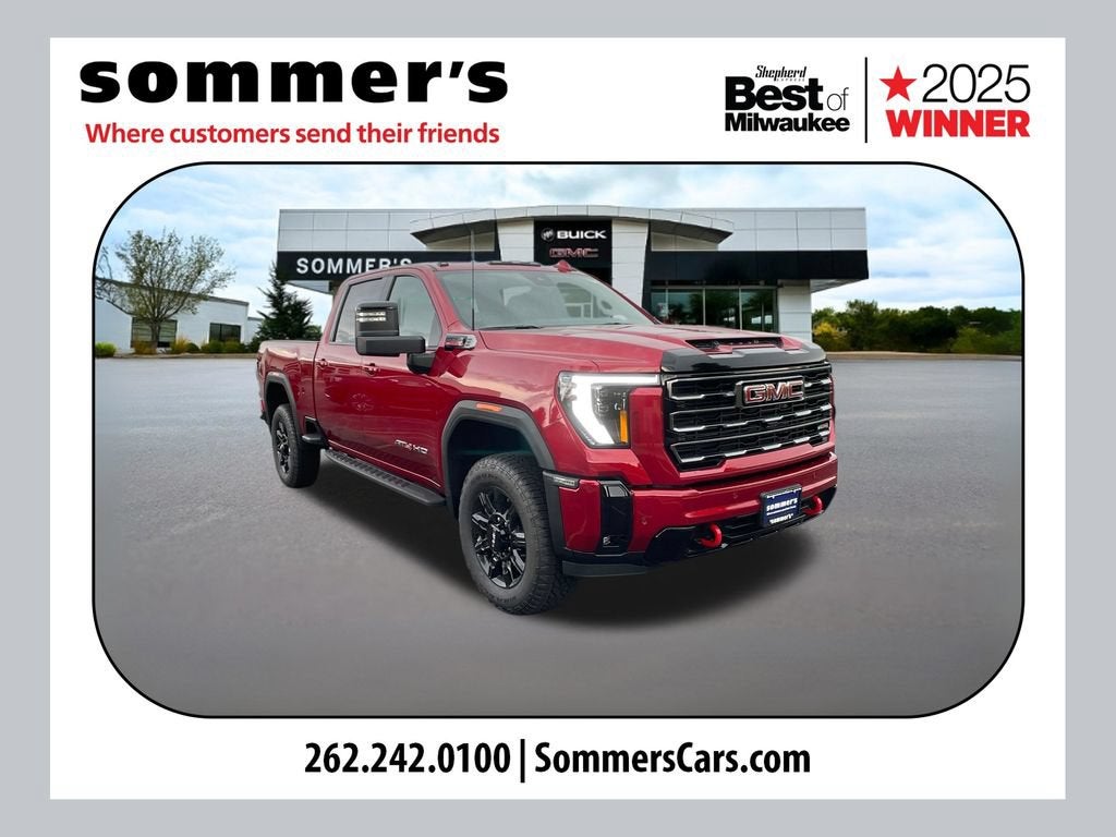 2026 GMC Sierra 2500 HD AT4 in Volcanic Red Tintcoat — front three-quarter view