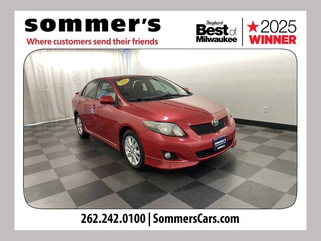 2010 Toyota Corolla Base in Red — front three-quarter view