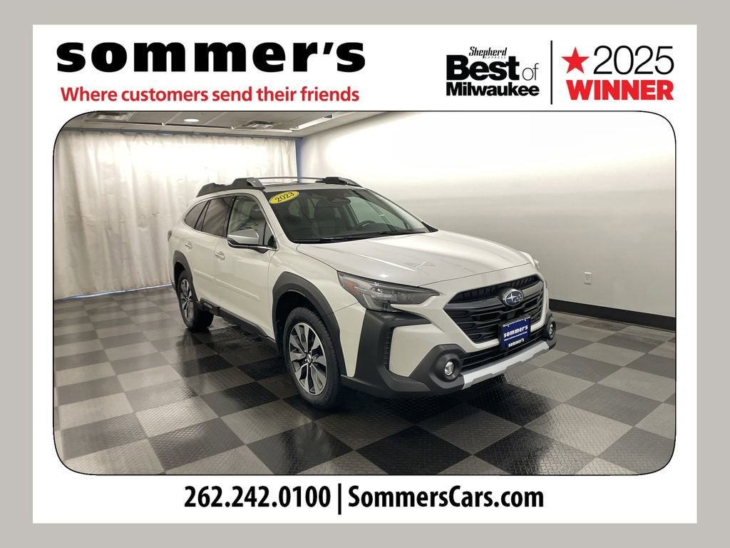 2023 Subaru Outback Touring in White — front three-quarter view